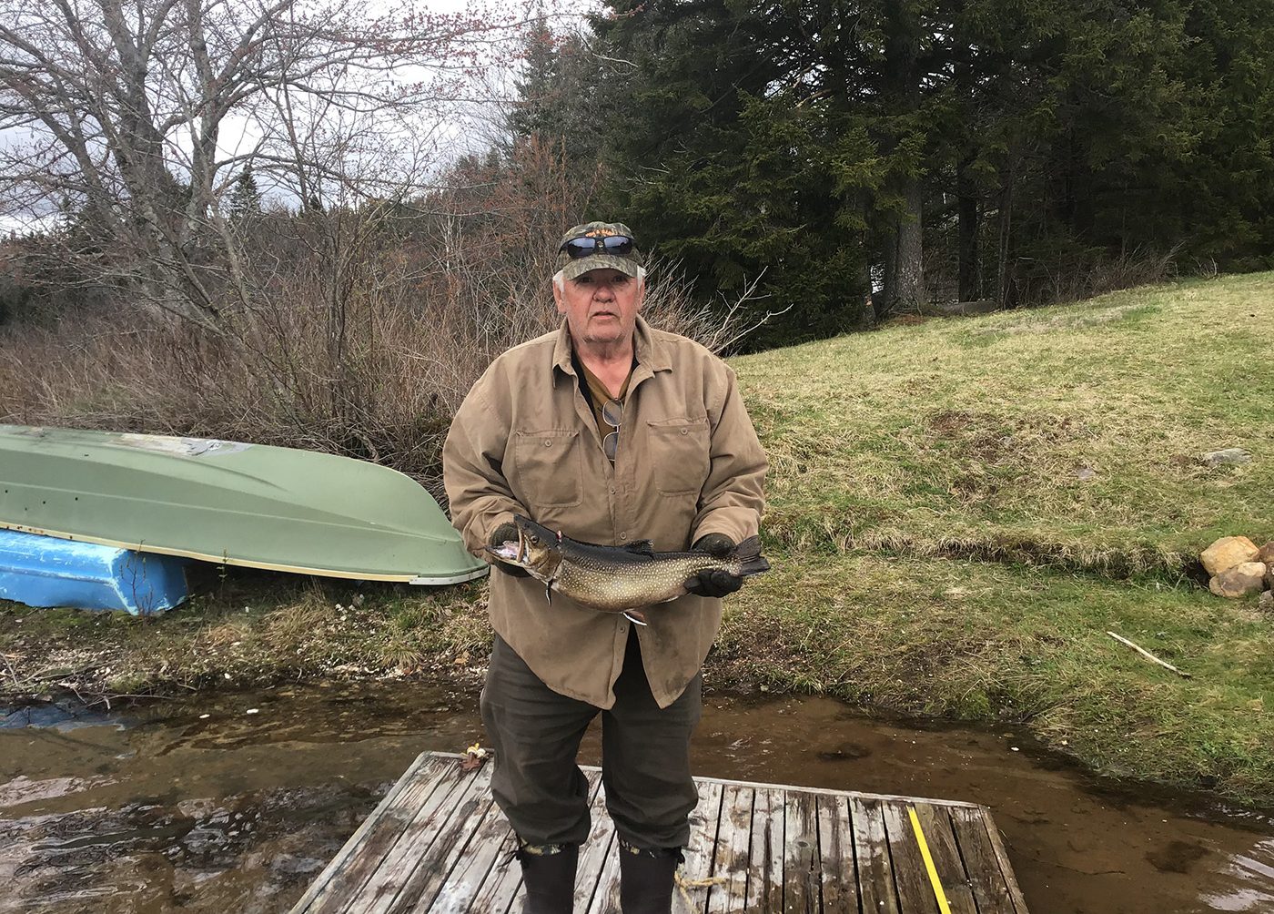 Man With Caught Fish Aspect Ratio 800 574